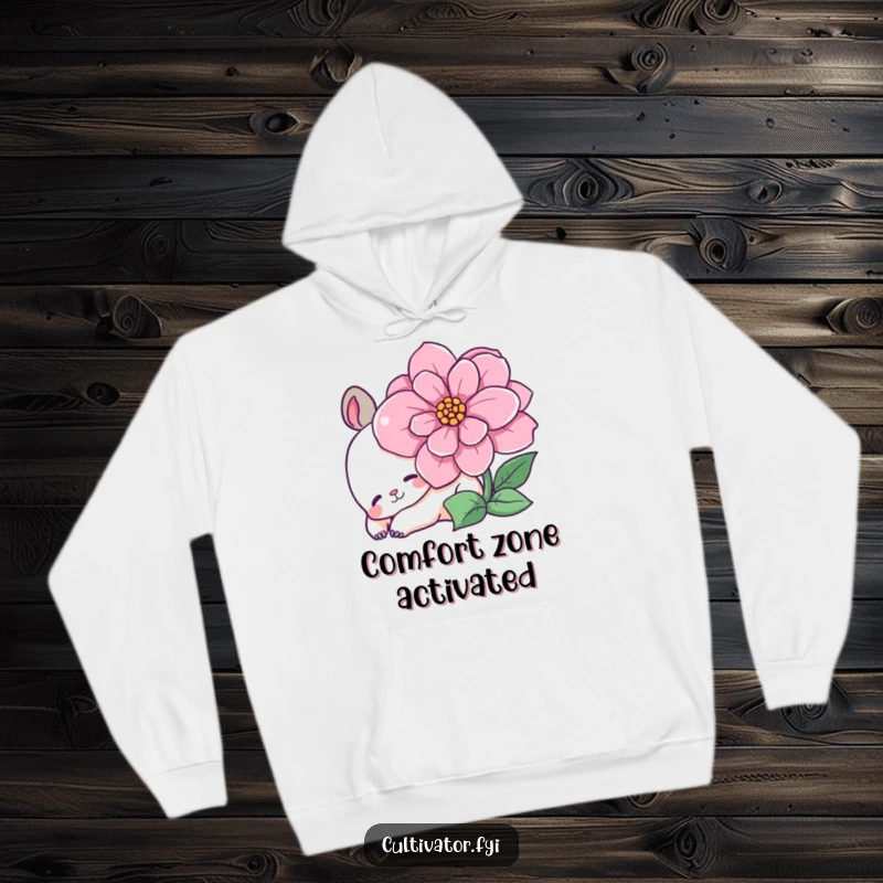 Funny hoodie depicting a content animal character comfortably resting near a stunning, blooming flower, symbolizing comfort and humor.